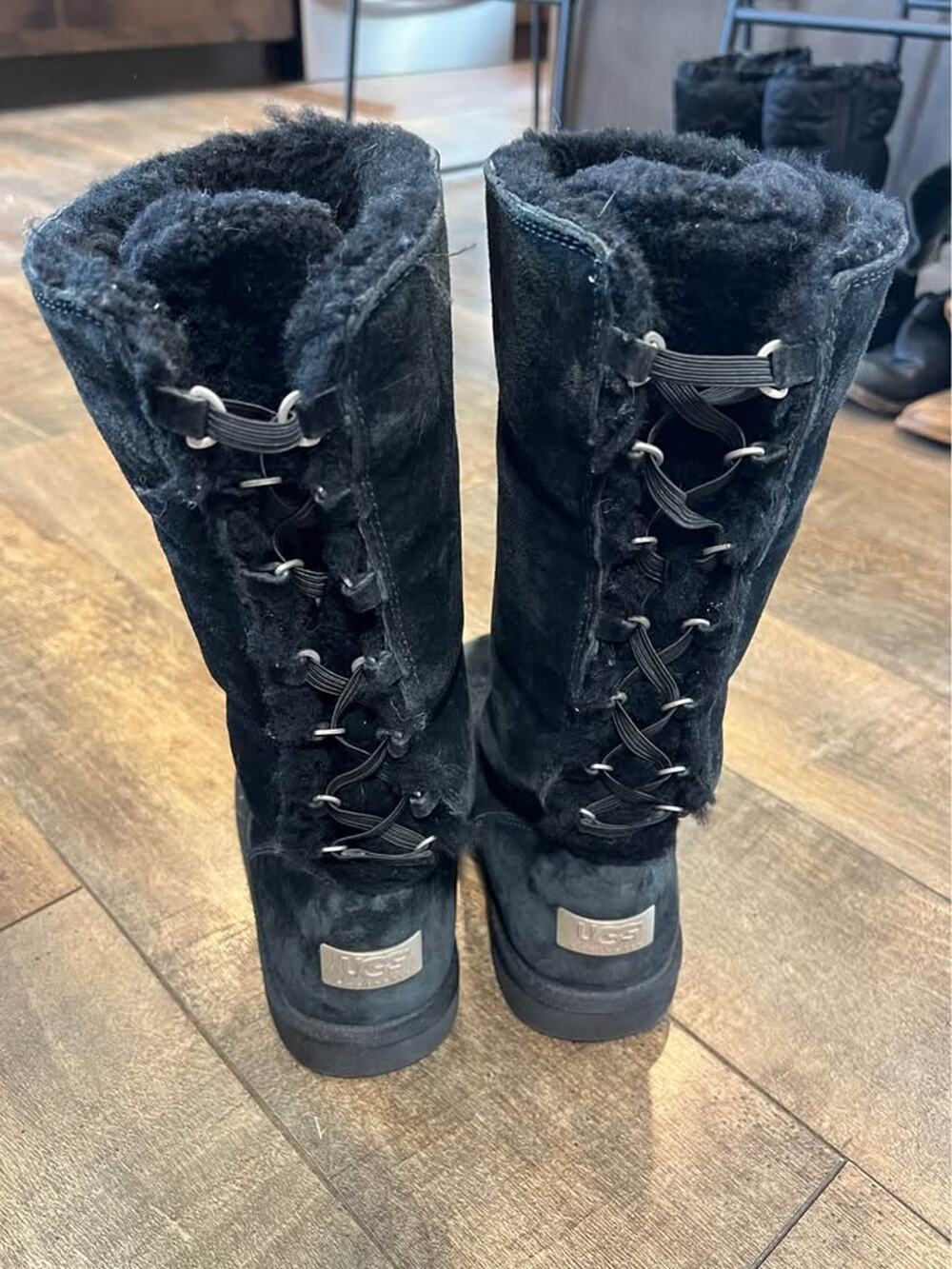 UGG Australia Roseberry black suede winter boots featuring sheepskin lining